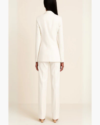 Women's elegant suit with fitted blazer and straight trousers — chic professional set